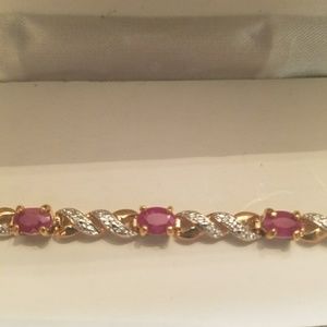 Lovely pink sapphire & gold bracelet.